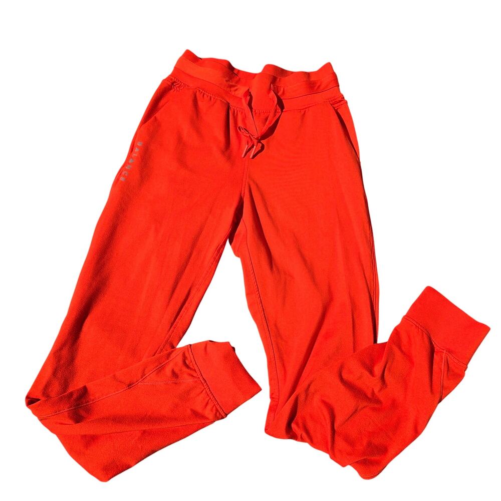 Balance Athletica Select Joggers in a vibrant blood orange color size medium